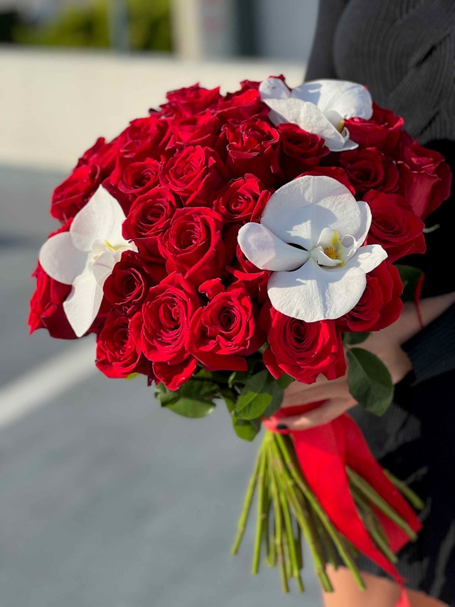 Red roses and orchids
